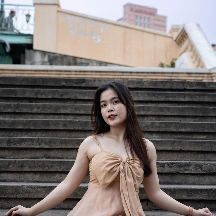 Avery Chen, Lead Design Curator at SignalSubtleAnchor, reviewing corporate floral arrangements