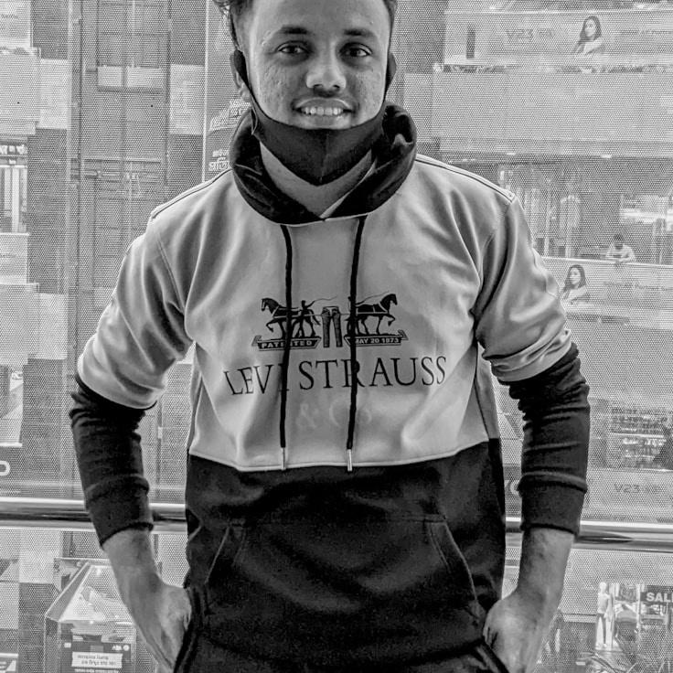 Jordan Singh, Client Relations Director, discussing corporate gifting strategy with business clients